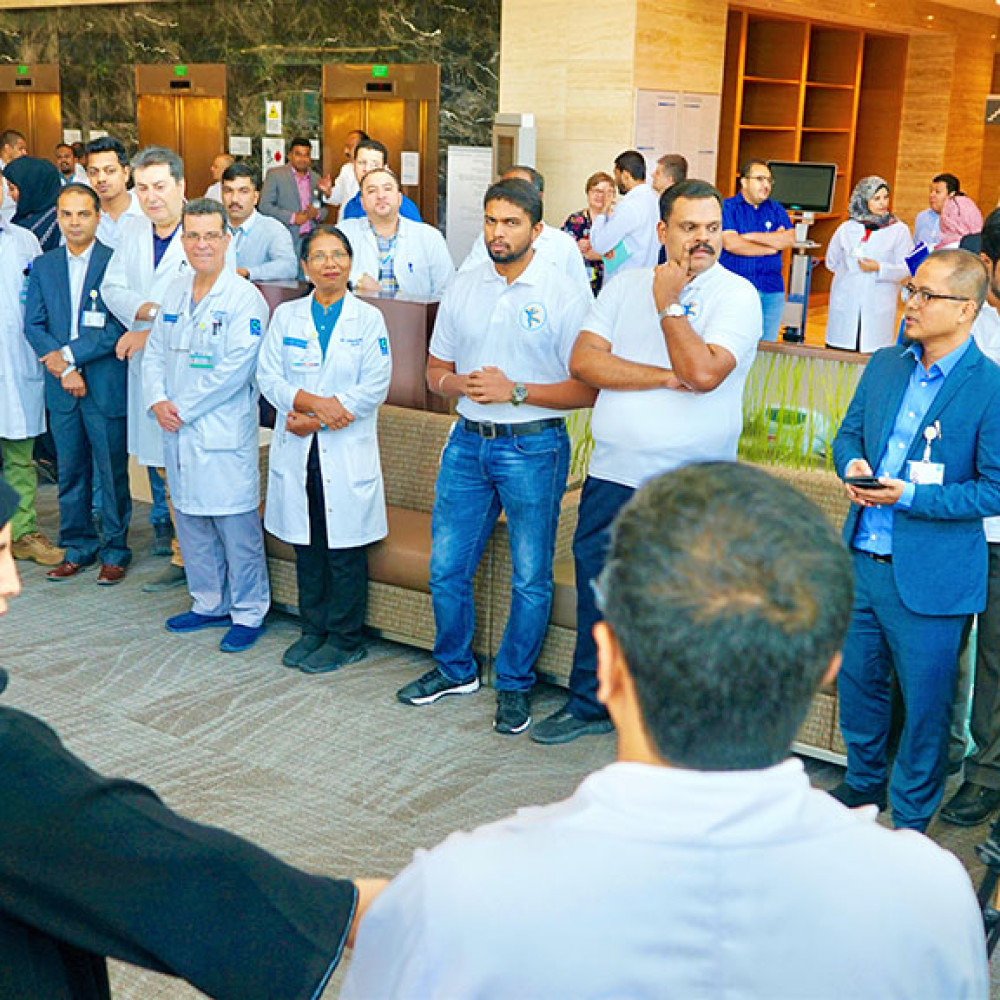 Photograph showing a celebration held in Qatar to mark World PT Day 2019