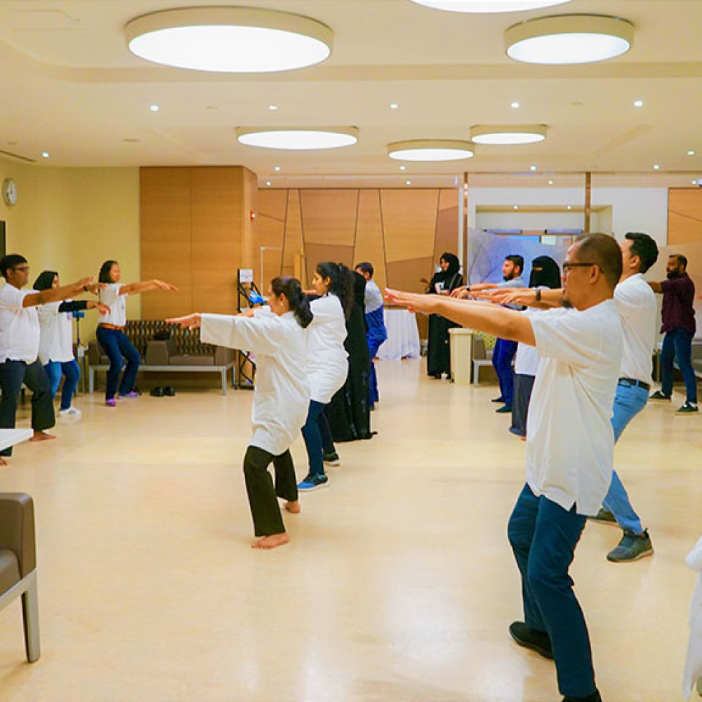 Photograph showing a celebration held in Qatar to mark World PT Day 2019
