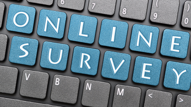 Photograph of keyboard showing online survey